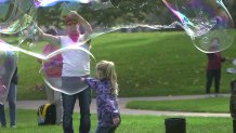 Kurth Reis entertains visitors with his bubbles in Sue Bierman Park on San Francisco's Embarcadero. 