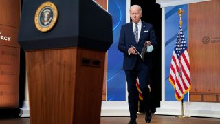 President Joe Biden arrives to deliver closing remarks to the virtual Summit for Democracy