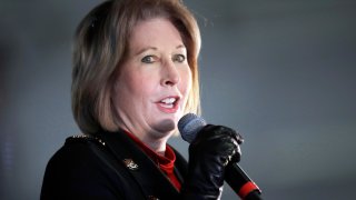 FILE - Attorney Sidney Powell speaks during a rally on Dec. 2, 2020, in Alpharetta, Ga. Powell and eight other lawyers allied with former President Donald Trump were ordered Thursday, Dec. 2, 2021, to pay Detroit and Michigan $175,000 in sanctions for abusing the court system with a sham lawsuit challenging the 2020 election results.