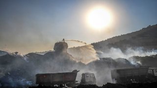 pollution caused by truck and coal-loading activity at a coal mine