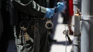 Keys and chains hang from the belt of a California Department of Corrections and Rehabilitation officer.