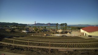A view from the top of the new Presidio Tunnel Tops project shows the newly-installed picnic terrace connecting to Crissy Field.