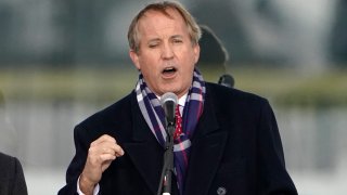 FILE - In this Jan. 6, 2021, file photo, Texas Attorney General Ken Paxton speaks in Washington, at a rally in support of President Donald Trump. The Supreme Court, though increasingly conservative in makeup, rejected the latest major Republican-led effort to kill the national health care law known as "Obamacare" on Thursday, preserving insurance coverage for millions of Americans. Paxton pledged to continue the fight against "Obamacare," which he called a "massive government takeover of health care."