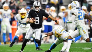 Marcus Mariota #8 of the Las Vegas Raiders rushes the ball during the third quarter against the Los Angeles Chargers at Allegiant Stadium on January 09, 2022 in Las Vegas, Nevada.