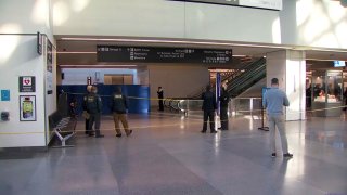 Officials investigate a deadly police shooting near the BART station at San Francisco International Airport.