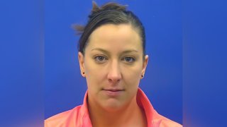 This driver's license photo from the Maryland Motor Vehicle Administration (MVA), provided to AP by the Calvert County Sheriff's Office, shows Ashli Babbitt.