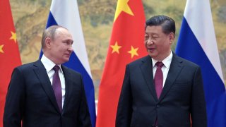 Russian President Vladimir Putin (left) and Chinese President Xi