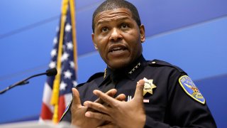 San Francisco Police Chief William Scott answers questions during a news conference
