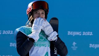 Eileen Gu, of China, reacts after competing during the women's freestyle skiing big air finals of the 2022 Winter Olympics, Feb. 8, 2022, in Beijing.