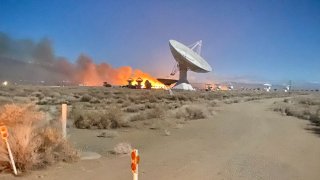 A wildfire burns in eastern California's remote Owens Valley.