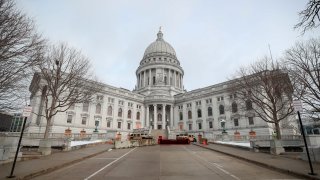 Barricades are seen in front of the State Capitol in Madison, Wisconsin,