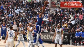 LOS ANGELES, CA – FEBRUARY 14: Terance Mann #14 of the LA Clippers drives to the basket during the game against the Golden State Warriors on February 14, 2022 at Crypto.Com Arena in Los Angeles, California. (Photo by Andrew D. Bernstein/NBAE via Getty Images)