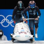 Kaillie Humphries and Kaysha Love of Team USA compete in a 2-woman bobsleigh heat at the 2022 Winter Olympic Games, Feb. 19, 2022.