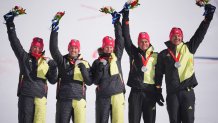 Members of Team Germany celebrate their silver medal win in the Mixed Team Parallel big final on day 16 of the 2022 Winter Olympics at National Alpine Ski Centre on Feb. 20, 2022, in Yanqing, China.