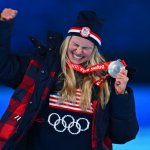 Silver medallist USA's Jessie Diggins celebrates her silver medal during the cross-country skiing women's 30km mass start victory ceremony at the 2022 Winter Olympic Games Closing Ceremony, Feb. 20, 2022, Beijing.