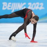 Kamila Valieva of Team ROC falls during the Women's Free Skate at the 2022 Winter Olympic Games, Feb. 17, 2022, in Beijing.