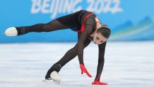 Kamila Valieva of Team ROC falls during the Women's Free Skate at the 2022 Winter Olympic Games, Feb. 17, 2022, in Beijing.