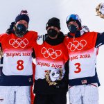 (L-R) Silver medalist David Wise of Team United States, gold medalist Nico Porteous of Team New Zealand and bronze medalist Alex Ferreira of Team United States celebrate during the Men's Freestyle Skiing Halfpipe flower ceremony on day 15 of the Beijing 2022 Winter Olympics at Genting Snow Park on Feb. 19, 2022, in Zhangjiakou, Hebei Province of China.