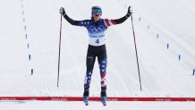 Jessie Diggins of Team United States celebrates winning silver during the Women's Cross-Country Skiing 30k Mass Start Free on day 16 of the 2022 Winter Olympics at The National Cross-Country Skiing Centre on Feb. 20, 2022, in Zhangjiakou, China.