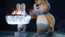 The polar bear mascot extinguishes the Olympic flame during the 2014 Sochi Winter Olympics Closing Ceremony at Fisht Olympic Stadium on February 23, 2014 in Sochi, Russia.