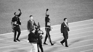 Men Receiving Olympic Medals