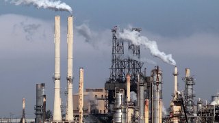 Steam rises from stacks at the Conoco-Phillips refinery.