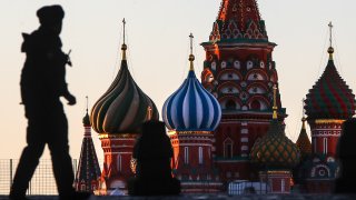 A police officer patrols a deserted Red Square during the pandemic of the novel coronavirus (COVID-19).