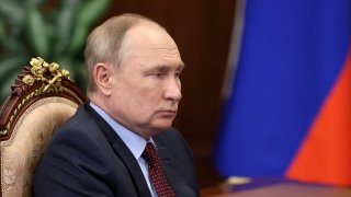 Russian President Vladimir Putin attends a meeting with the head of the Russian Union of Industrialists and Entrepreneurs Alexander Shokhin in Moscow, Russia March 2, 2022. 