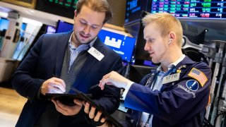 Traders on the floor of the NYSE, March 2, 2022.