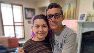 In this handout photo provided by Maria Elena, Gustavo Cardenas, one of six oil executives jailed in Venezuela, poses for a photo with his daughter Maria Mercedes, in their home in Houston, Wednesday, March 9, 2022.