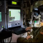Aerial Recon Weather Officer Lt. Col. Tobi Baker.