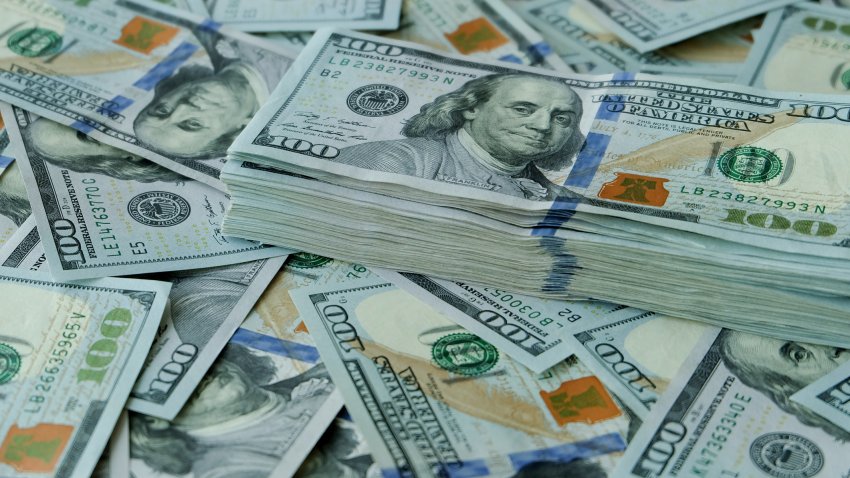 Stacking of US Dollar bank notes.