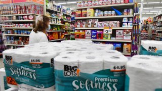 A person shops for groceries and household products in Alhambra, California, on April 12, 2022. 