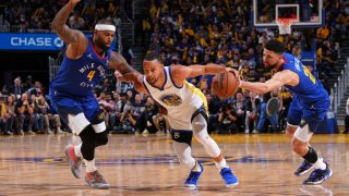 SAN FRANCISCO, CA – APRIL 18: Stephen Curry #30 of the Golden State Warriors drives to the basket against the Denver Nuggets during Round 1 Game 2 of the 2022 NBA Playoffs on April 18, 2022 at the Chase Center in San Francisco, California. NOTE TO USER: User expressly acknowledges and agrees that, by downloading and/or using this Photograph, user is consenting to the terms and conditions of the Getty Images License Agreement. Mandatory Copyright Notice: Copyright 2022 NBAE (Photo by Garrett Ellwood/NBAE via Getty Images)