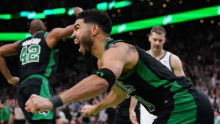 Apr 17, 2022; Boston, Massachusetts, USA; Boston Celtics forward Jayson Tatum (0) reacts after making the game winning basket against the Brooklyn Nets in the second half during game one of the first round for the 2022 NBA playoffs at TD Garden. Mandatory Credit: David Butler II-USA TODAY Sports