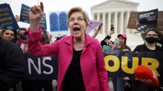 U.S. Senator Elizabeth Warren (D-MA) reacts during a protest outside the U.S. Supreme Court, after the leak of a draft majority opinion written by Justice Samuel Alito preparing for a majority of the court to overturn the landmark Roe v. Wade abortion rights decision later this year, in Washington, May 3, 2022.