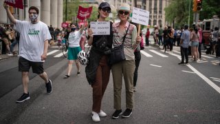 marching across the Brooklyn Bridge into Manhattan