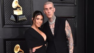 FILE - Kourtney Kardashian, left, and Travis Barker appear at the 64th Annual Grammy Awards in Las Vegas on April 3, 2022. According to reports, Friday, May 20, Kardashian and Barker hit Portofino for a long wedding weekend.