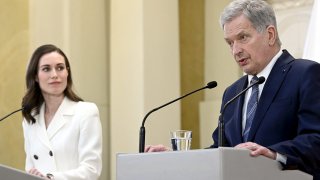 Finland's Prime Minister Sanna Marin (L) and Finland's President Sauli Niinistö