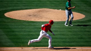 Shohei Ohtani #17 of the Los Angeles Angels hits a single against the Oakland Athletics in the eighth inning at Angel Stadium of Anaheim on May 22, 2022 in Anaheim, California. (Photo by Ronald Martinez/Getty Images)
