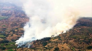 A brush fire burns in Napa County.