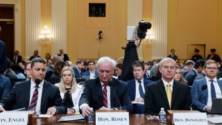 From left, former Assistant U.S. Attorney General for the Office of Legal Counsel Steven Engel, former Acting U.S. Attorney General Jeffrey Rosen and former Acting U.S. Deputy Attorney General Richard Donoghue, prepare to testify as the House select committee investigating the Jan. 6 attack on the U.S. Capitol continues, Friday, June 23, 2022, at the Capitol in Washington.