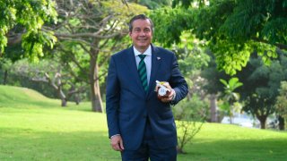 In this photo provided by Diario Libre, The Dominican Republic’s Minister of the Environment and Natural Resources Orlando Jorge Mera poses for a publicity photo in Santo Domingo, Dominican Republic, May 18, 2022.