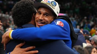 Juan Toscano-Anderson #95 of the Golden State Warriors celebrates.