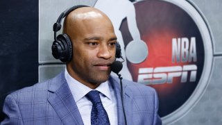 MIAMI, FLORIDA - OCTOBER 15: ESPN commentator Vince Carter looks on prior to a preseason game between the Miami Heat and the Boston Celtics at FTX Arena on October 15, 2021 in Miami, Florida.