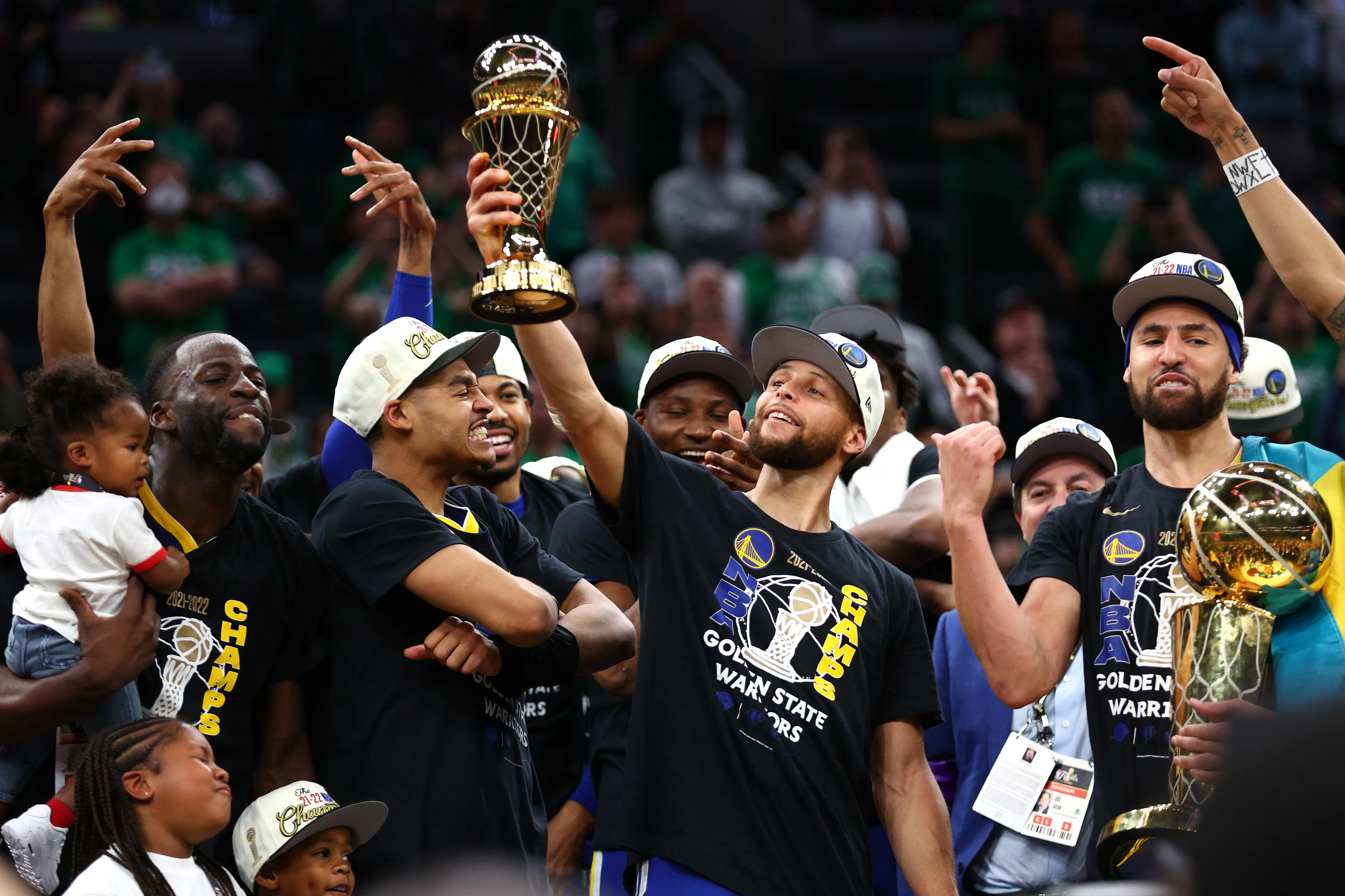 Draymond Green Klay Thompson & Stephen Curry Golden State Warriors Unsigned  2022 NBA Finals Celebration Photograph