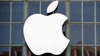 The Apple logo is seen on the outside of Bill Graham Civic Auditorium before the start of an event in San Francisco, California on September 7, 2016. – Apple on Wednesday is expected to introduce a new iPhone and perhaps a second-generation smartwatch as it polishes its lineup of devices to shine during the year-end shopping season. The rumor mill has been grinding away with talk of iPhone 7 models that will boast faster chips, more sophisticated cameras, and improved software while doing away with jacks for plugging in wired headphones. (Photo by Josh Edelson / AFP) (Photo by JOSH EDELSON/AFP via Getty Images)