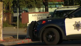 Police at the scene of a stabbing and shooting at Hillview Branch Library in San Jose.