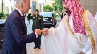 Saudi Crown Prince Mohammed bin Salman fist bumps U.S. President Joe Biden upon his arrival at Al Salman Palace, in Jeddah, Saudi Arabia, July 15, 2022.