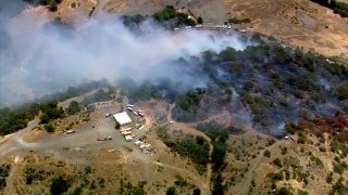 Firefighters battle a fire in Cordelia.